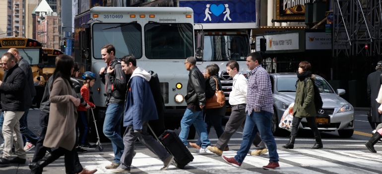 people crossing a street