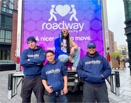 Roadway's movers with a happy customer