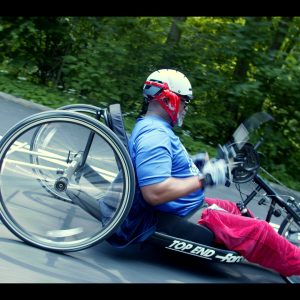 Hand-cyclist-riding-down-a-hill.jpg