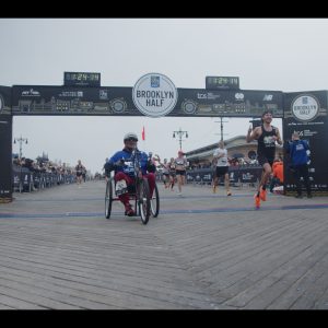 Long-shot-of-Hand-cyclist-crossing-the-finish-line.jpg