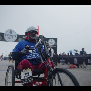 Medium-shot-of-Hand-cyclist-crossing-the-finish-line.jpg