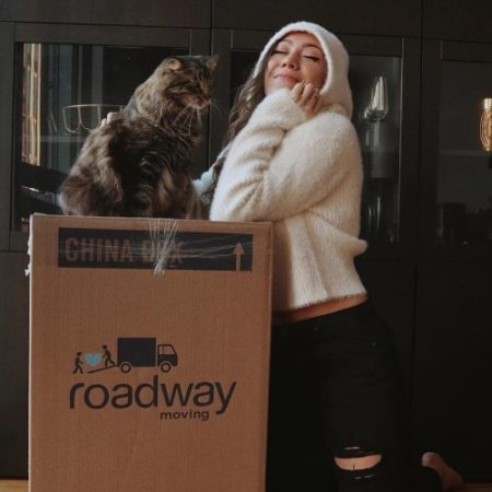 happy-customer-with-her-cat-during-a-move-with-roadway-moving.jpg