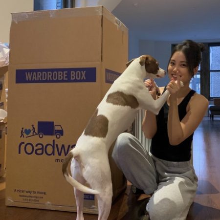 michelle-choi-with-her-dog-during-a-move-with-roadway.jpg