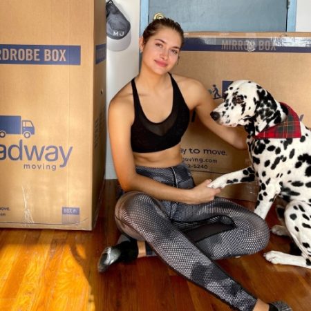 monica-aksamit-with-her-dog-during-a-move-with-roadway-moving.jpg