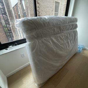 packing-a-mattress-scaled.jpg